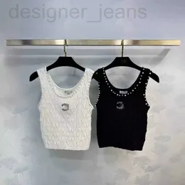 Kvinnors t-shirtdesigner tidigt på våren Ny choreansk original Sufeng Heavy Industry Letter Nail Beads Show Thin Sleeveless Sticked Top Qmzk