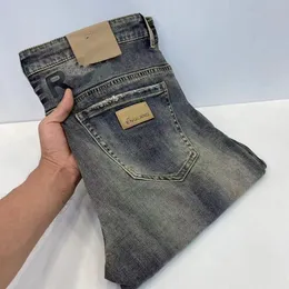 Nya jeans män designer jeans mens elasticitet mager jeans ny produkt hög slutkvalitet stor ko smal passar små fötter långa byxor denim byxa motorcykelbyxor