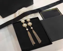 Marka żółty złoto Kolor mody Kobieta Pearls Kolczyki Geja Dream Party Wysokiej jakości łańcuch Tassel Studing Jewelry20319282682789