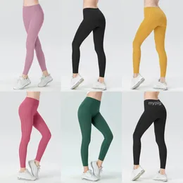 European and American high waisted fitness pants without T-line womens double-sided brocade nude feeling peach lifting buttocks tight yoga pants 2024 new model