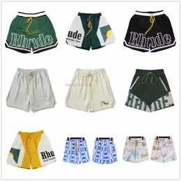 2023 Ny designer Rhude Summer Fashion Beach Mens Shorts Män högkvalitativ gata slitage Rödblå svarta byxor RH Court Svettbottnar