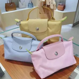 Lüks yüksek kaliteli tasarımcı çanta uzun moda erkek kadınlar düz renk çanta tasarımcıları debriyaj tote siyah crossbody çanta