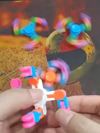 Creative and versatile chain, three four six claw fingertip gyroscope, leisure decompression children's toys, cross-border fingertip rotation deformation gyroscope