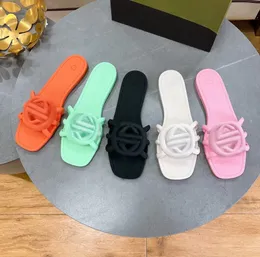 Дизайнерские сандалии женская пряжка G Slippers Резиновые тапочки женский пляжный желе оранжевый лето и осенние мулы на открытом воздухе.