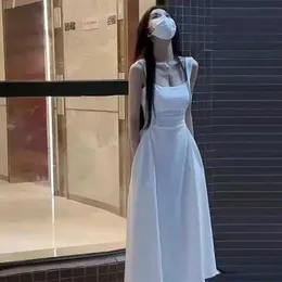 Vestido de suspensório branco para crianças New French Tea Break para verão 2024 Pequeno estatura Primeira cintura de amor até um vestido de longa linha