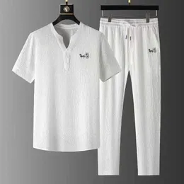 Traccetti da uomo 2022 Summer Chinese New Mens Casual Set T-shirt+pantaloni da uomo a due pezzi da jogging da jogging sportivo