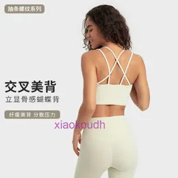 デザイナートップスセクシーなLUL女性ヨガ下着Shishi Mengke Fixed Chest Cushion Integrated Sports Bra High Strught Cross Hollow Back Fitness