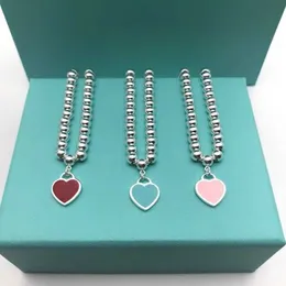 سلسلة T di Family Love Silver Glue Glue Monamel Round Bead Bracelet Womens Peach Heart Red Blue Pink Tri Color Buddha Q240507