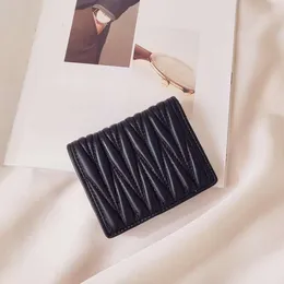 Exklusiv butik bästsäljande plånbok ny 85% fabrikskampanj Miao Family Leather Womens Short Student Korean Söt mode Small Half Fold Zero Bag