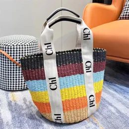 Mulheres Woody Raffias Cesta de palha Tote Bolsas de praia Pão de designer e bolsa masculina Torce grandes sacos de compras de luxo ombro de ombro de ginástica de ginástica de ginástica