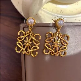 European and American Geometric Abstract Pearl Advanced Stylish Earrings Square Hollow French Retro Studs Cold Wind Earrings