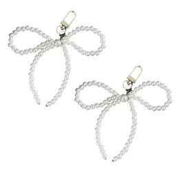 2pcs Telefon Charme Anhänger Bowknot -Schlüsselbund für Bag Gurt Frauen Mädchen Handy Lanyard Keyring Kamera Schmuck 240425