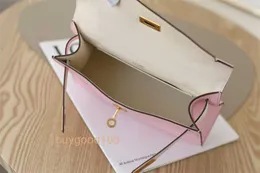 トップレディースデザイナーkiaelliyバッグジューンミニジェネレーションB彫刻レザーゴールドボタンレディースハンドバッグ
