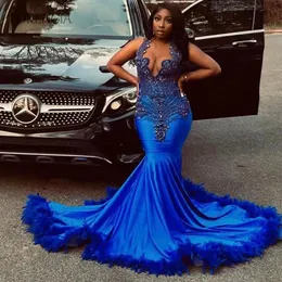Mermaid Prom Dresses 2024 Luxury blue Crystal Beaded Sheer Neck Sexy Popular Long Prom Gowns for Black Girls with Feathers