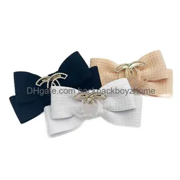 Designer Dog Hair Bow con motivo classico Lettere Lussuoso Cuccioli Bows Cat Topknot Pet Chieperstone Rhinestones Grooming Bowknot Acces Dhdla