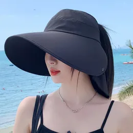 幅広のブリムUVネック保護ソーラービーチバケツハット折りたたみ可能なポニーテールトラベルパナマレディースハット240429の女性の夏の帽子