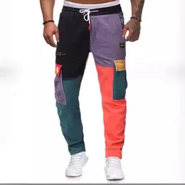 Calças casuais de veludo lacible Corduro Men coloridas harém jogadores de moda harajuku calça de moletom de hip hop masculino calça ur51 220816