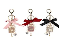 Keychains Fashion Imitation Pearl Perfume Bottle Keychain Car Key Ring Holder Bag Charm Pendant Accessories Bow KeyFob Women Keyri1934876
