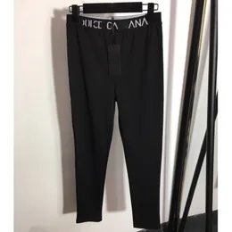 2024 Designers kvinnors aktiva kläder aktiva byxor kläder sportkläder casual luxurys klänning ny brevvävd stretch bantning leggings yoga byxor svart vit smlxl