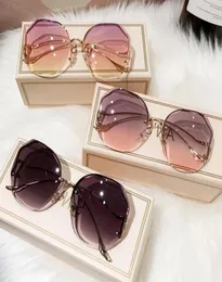 Sunglasses 2022 Women Fashion Rimless Vintage Gradient Sun Glasses Design For Female Big Frame Metal Okulary UV4005299914