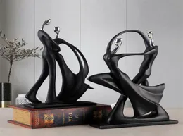 クリエイティブシンプルなモダンな抽象黒人像の家の装飾アクセサリーギフトジオメトリ樹脂ダンスカップル彫刻7400671