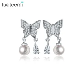 Luoteemi yeni yüksek kaliteli kadınlar güzel bayanlar imitasyon inci kelebek tasarımı gümüş pim kulak saplamaları küpeler parti mücevherleri1724957