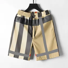 Checkered casual shorts, men's youth sports beach pants, new summer pentagonal pants, trendy and fashionable shorts