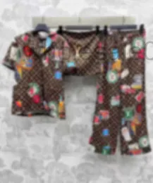 Women's Two Piece Pants designer Designer Brand Summer newspaper colorful seal print pajamas pantsuit with lapel short-sleeved shirt elastic straight-leg pants QORJ
