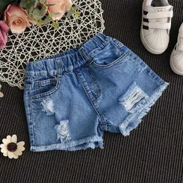 Shorts jeans de menina de menina 2024 Verão Crianças Versão coreana de calças jeans High Casual Troushers Girl Ripped Jeans 2-12 D240510