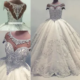 Designer Luxurious Pärled Crystals Arabic Ball Gown Wedding Dresses 2018 Senaste Sheer Cap ärmar Pärlor Sökare Puffy Long Bridal Gow 231A