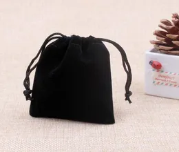 Бархатные ювелирные сумки 5x7 см черные подарки сумок из сумок из ювелирных изделий для ювелирных изделий шейки для рождественских подарочных мешочков5649302