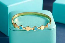 Designer armband lyxiga smyckemärke armband titan stål kvinnor och mäns klassiska presentarmband