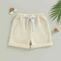 Shorts 0-3T Sommer Jungen Sportshorts Solid Color Elastic Casual Mode Shorts Baby Neugeborene Shorts Schwarzer grau Beige D240510