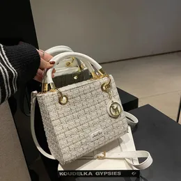 Designer di lusso in metallo in metallo lana in lana kintting womens borsetta per borse a traversa casual tote quadrata 240429