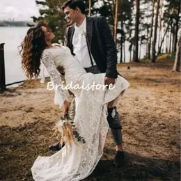 Unikalna sukienka ślubna Boho z koronką 2022 z rozbłyskowanymi rękawami seksowna V Neck Syrenca Bohemian Suknie ślubne Backless Crochet Hippie Country Bri 2803