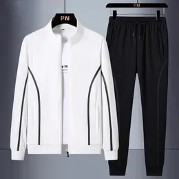 Mens tracksuit Spring Spring Casual Jogging Conjuntos de homens com zíper de zíper 2pcssweatpant academia de fitness sportswear 240511