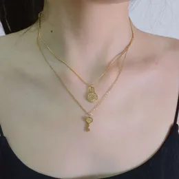 S925 Silver Tiffanyjewelry Heart Pendants Korean version med enkel tryckning Key Love Lock Snake Bone Chain Double Layer Titanium Steel Necklace mångsidig kvinna