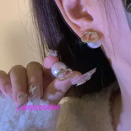 Aavaleno Top Edition Designer Delicate Earing French Style Small Fragrant Pearl earringsdshaped Full Diamond Earrings 2024 New Light Luxury Social