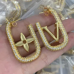 Designer Gold U-förmiges Vier-Blatt-Klee-Ohrringe für Frauen Senior Classic Klassiker kleiner duftender Windohrschstene 18K Goldlicht Luxusblitzschmuck Versorgung
