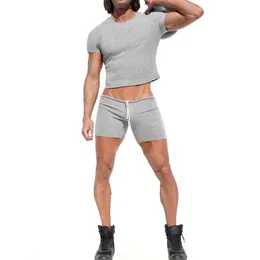 Летние мужские наборы причинного сплошного цвета с коротким рукавом круглая шея T Shirtssport Shorts костюма 2 шт.