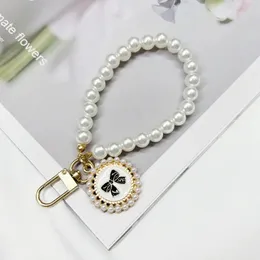 Short Pearl Lanyard Fashion Rhinestone Pendant Pendant Mobile Phone Lanyard Hand-woven Wrist Strap Back Case Anti-lost Lanyard