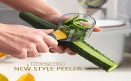 Epacket Fruit Vegetable Tools Peeler med handtag Roll Skin Tube Storage Box Apple Carrot Gurka Rostfritt stål Multifunktion5936003