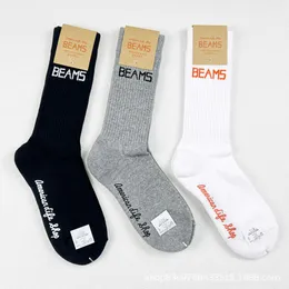 Herrensocken strahlt japanische trendige Markensocken für Herren und Frauen mit mittlerer Länge mitteldickte Handtuchboden Basketball High Top Calf Socken Instagram