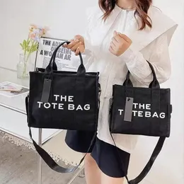 Designer Marc Canvas Jacobslatherather Bag de volta com patch women bolsa de couro compras pequenas mini bolsas médias bolsas pretas grandes bolsa de moda de luxo y3ow#