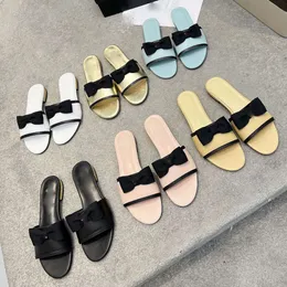 Dgate Camellia Designer Designer Kapcie Bowknot moda Włochy luksusowe slajdy sandały dla damskich damskie letnie suwaki buty płaskie skórzane muły