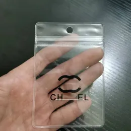 Jewelry storage bag PVC transparent hanging hole bag ID card sleeve plastic designer classic logo printing dustproof self sealing bag 100pc/lot wholesale