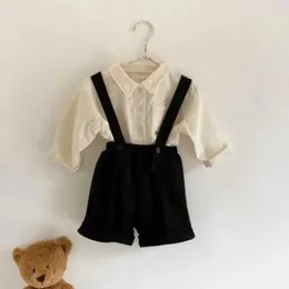 Kombinezon 2023 Autumn New Baby Cute Bear Hafted Flip Collar Shirt Solid Baby Płaszcz Bawełniany nowonarodzony kombinezon chłopcy i dziewczęta odzież D240515