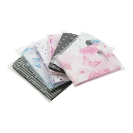 Ударные мешки с ювелирными мешками 15x9 см. Сердце и бабочка звездные розовые узоры пластиковые подарочные пакеты.