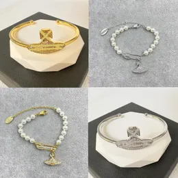 NEU Senior Vivianr Saturn Orbit Anhänger Halsketten Armband Mode Designer Perlenkettenarmband für Frauen leuchtende Nadelstapelketten Geburtstagsgeschenke