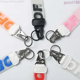 2023 Fashion Off Transparent White Key Chain Designer intagliato in lega uomini e donne che pendono portachiavi decorativi con squisito packagin nlxj bxzp